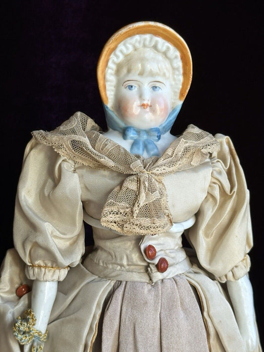 Antique German 12.5” China Shoulder Head Doll with Molded Bonnet