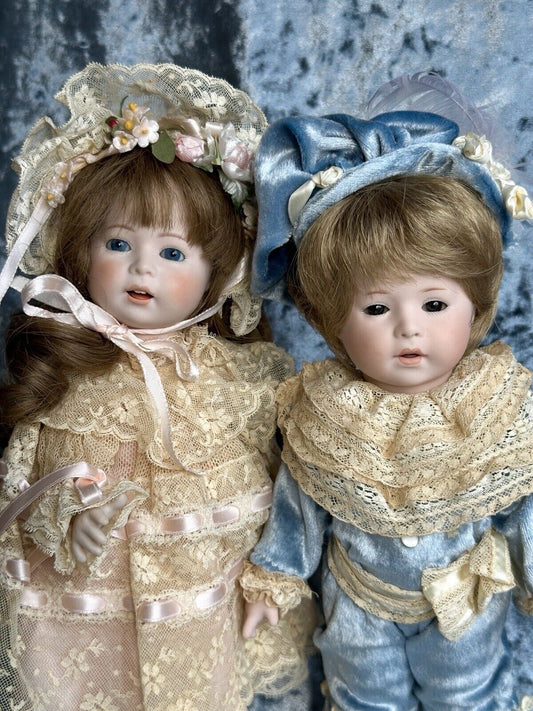 2 Rare Vintage Reproduction of Swaine & Co Porcelain Blue Boy & Pink Girl Dolls