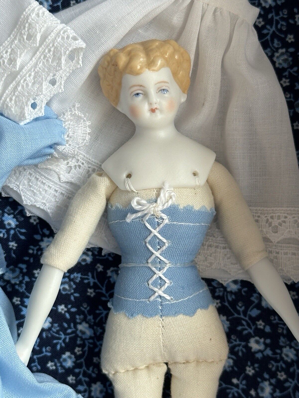 Collectible Porcelain Repro of China Doll by Rosemarie Snyder with Wardrobe