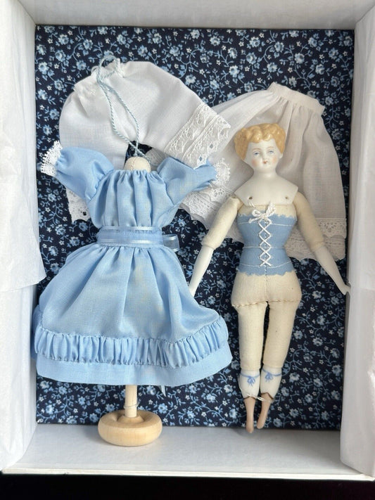 Collectible Porcelain Repro of China Doll by Rosemarie Snyder with Wardrobe